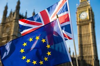 European Union and British Union Jack flag flying in front of Big Ben and the Houses of Parliament